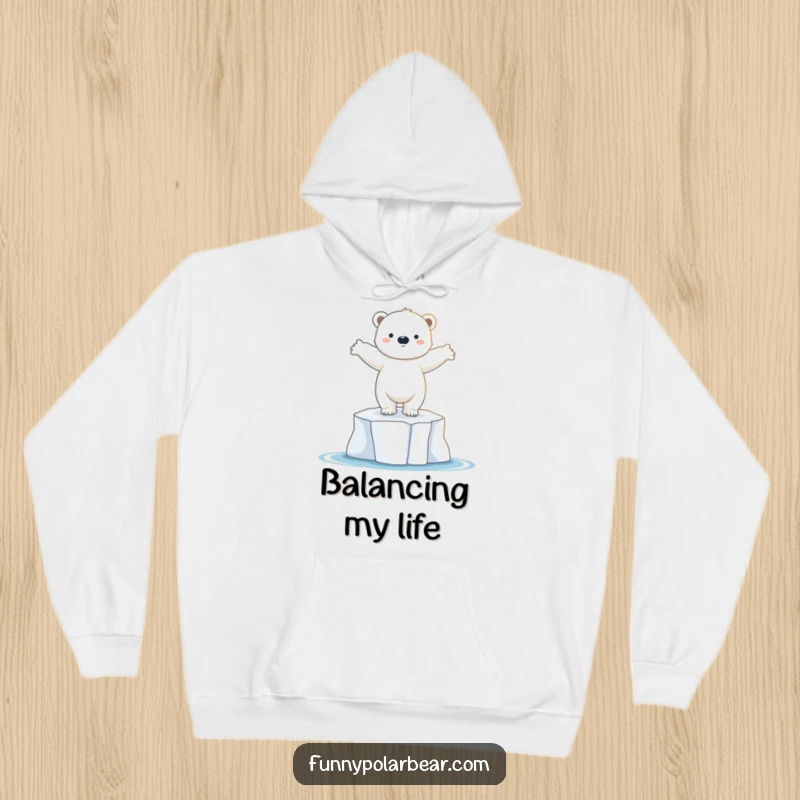 Funny polar bear cub hoodie, dancing on ice floe, graceful pose, cozy arctic apparel, soft fleece.
